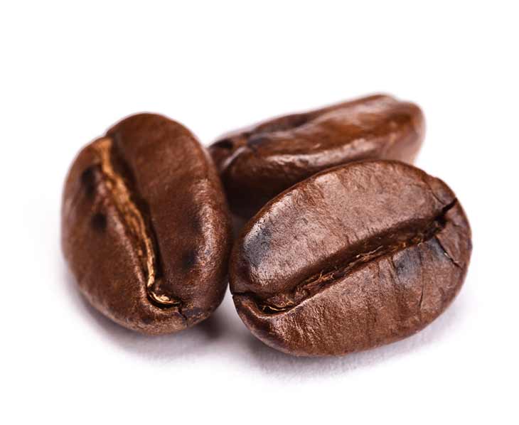 three coffee beans close up